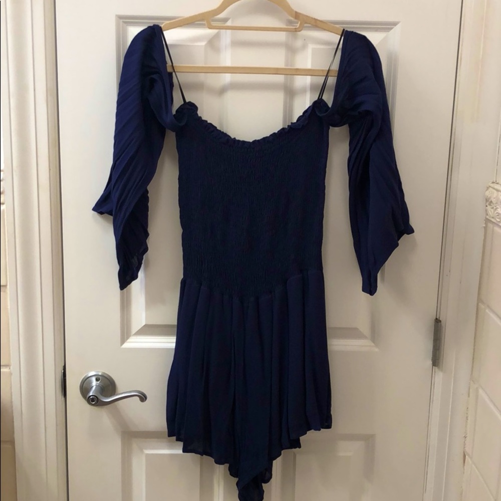 Lightly worn navy off the shoulder romper